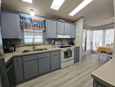 Discover Florida Living in this 1989, 2-bed/2-bath home located on The Club At Pointe West in Florida - for sale on GolfHomes.com, golf home, golf lot