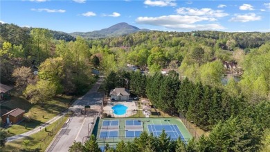 Build on this 0.28-acre lot that backs directly to the golf on Innsbruck Resort and Golf Club in Georgia - for sale on GolfHomes.com, golf home, golf lot
