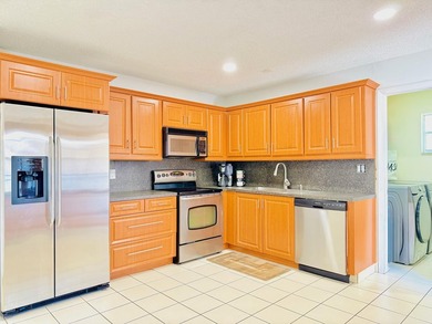 You'd be hard pressed a condo like this OVERSIZED 1900 FT OPEN & on Woodmont Country Club in Florida - for sale on GolfHomes.com, golf home, golf lot