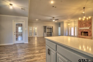 This beautiful 3-bedroom, 3-bathroom brick home in the heart of on Cedar Creek Country Club in Texas - for sale on GolfHomes.com, golf home, golf lot