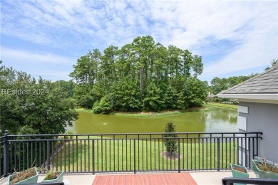 Stunning estate home situated on Eagle Lake in Berkeley Hall on Eagles Pointe Golf Club in South Carolina - for sale on GolfHomes.com, golf home, golf lot