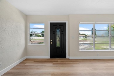 Offered for sale is this incredible, renovated, 2-bedroom on Pasadena Yacht and Country Club in Florida - for sale on GolfHomes.com, golf home, golf lot