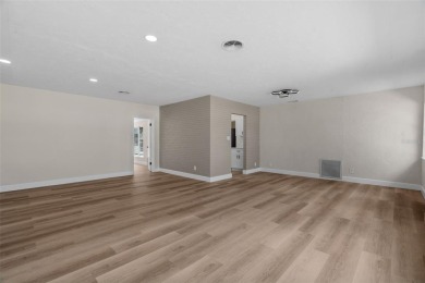 Offered for sale is this incredible, renovated, 2-bedroom on Pasadena Yacht and Country Club in Florida - for sale on GolfHomes.com, golf home, golf lot