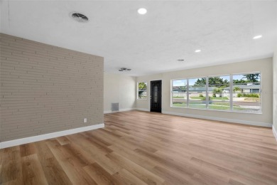 Offered for sale is this incredible, renovated, 2-bedroom on Pasadena Yacht and Country Club in Florida - for sale on GolfHomes.com, golf home, golf lot