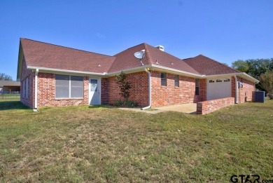 This beautiful 3-bedroom, 3-bathroom brick home in the heart of on Cedar Creek Country Club in Texas - for sale on GolfHomes.com, golf home, golf lot