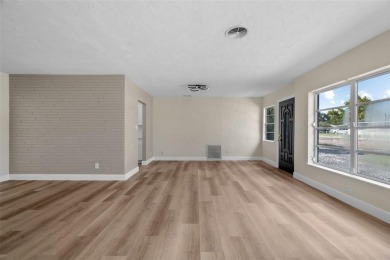 Offered for sale is this incredible, renovated, 2-bedroom on Pasadena Yacht and Country Club in Florida - for sale on GolfHomes.com, golf home, golf lot
