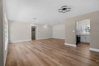 Offered for sale is this incredible, renovated, 2-bedroom on Pasadena Yacht and Country Club in Florida - for sale on GolfHomes.com, golf home, golf lot