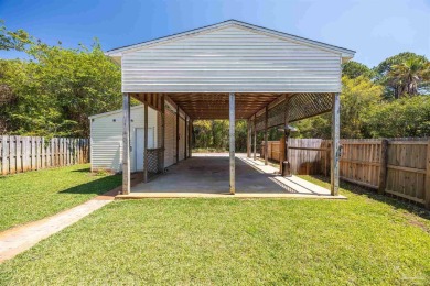 Welcome to this beautifully maintained 3-bedroom, 2-bath on Tiger Point Golf and Country Club in Florida - for sale on GolfHomes.com, golf home, golf lot