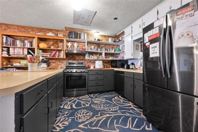 Rare opportunity to own a home on a DOUBLE lot right on the on Hide-A-Way Lake Golf Course in Texas - for sale on GolfHomes.com, golf home, golf lot