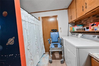 Rare opportunity to own a home on a DOUBLE lot right on the on Hide-A-Way Lake Golf Course in Texas - for sale on GolfHomes.com, golf home, golf lot