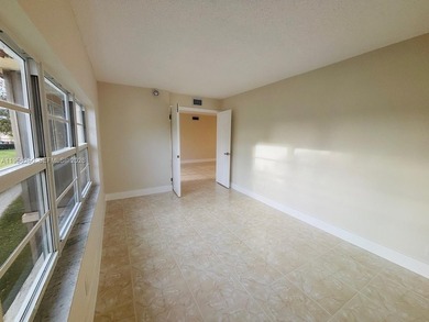 Renovated condo offers 1 bedroom plus den and 1.5 bathrooms on Hollybrook Golf and Tennis Club  in Florida - for sale on GolfHomes.com, golf home, golf lot