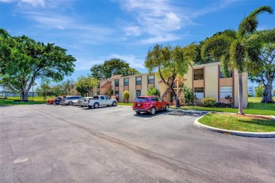 Tucked away in a desirable 55+ community in Margate, this on Oriole Golf and Tennis Club in Florida - for sale on GolfHomes.com, golf home, golf lot