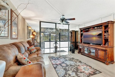 Tucked away in a desirable 55+ community in Margate, this on Oriole Golf and Tennis Club in Florida - for sale on GolfHomes.com, golf home, golf lot