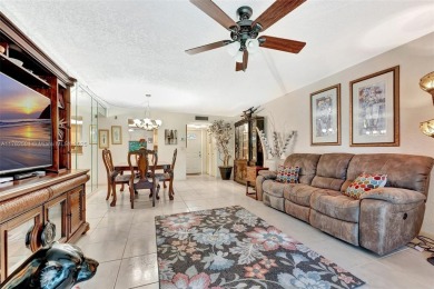Tucked away in a desirable 55+ community in Margate, this on Oriole Golf and Tennis Club in Florida - for sale on GolfHomes.com, golf home, golf lot