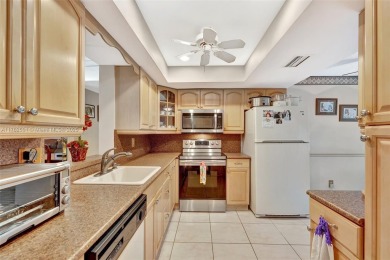Tucked away in a desirable 55+ community in Margate, this on Oriole Golf and Tennis Club in Florida - for sale on GolfHomes.com, golf home, golf lot