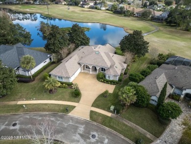 Nestled on a quiet cul-de-sac in the prestigious gated Cimarrone on Cimarrone Golf and Country Club in Florida - for sale on GolfHomes.com, golf home, golf lot