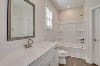 Experience elegant design and everyday functionality in this on Mount Vintage Plantation and Golf Club  in South Carolina - for sale on GolfHomes.com, golf home, golf lot