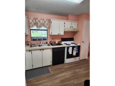 This 2 bedroom / 2 bath is all you need , perfect for the on Spanish Lakes Fairways in Florida - for sale on GolfHomes.com, golf home, golf lot