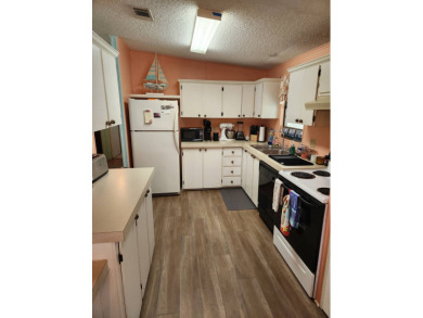 This 2 bedroom / 2 bath is all you need , perfect for the on Spanish Lakes Fairways in Florida - for sale on GolfHomes.com, golf home, golf lot