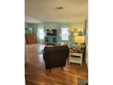 This 2 bedroom / 2 bath is all you need , perfect for the on Spanish Lakes Fairways in Florida - for sale on GolfHomes.com, golf home, golf lot