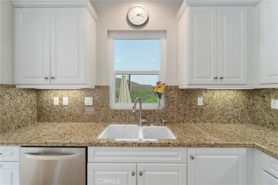 Welcome to effortless luxury in one of Corona's most exclusive on Glen Ivy Golf Club in California - for sale on GolfHomes.com, golf home, golf lot