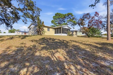 One or more photo(s) has been virtually staged. Move right into on Oak Hills Country Club in Florida - for sale on GolfHomes.com, golf home, golf lot