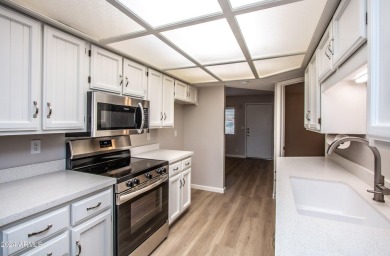 Recently remodeled, Move-in Ready, this charming Lock and Leave on Sunland Village Golf Club in Arizona - for sale on GolfHomes.com, golf home, golf lot