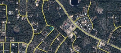 What a great spot to build a home. This corner lot is located on Sunny Hills Golf and Country Club in Florida - for sale on GolfHomes.com, golf home, golf lot