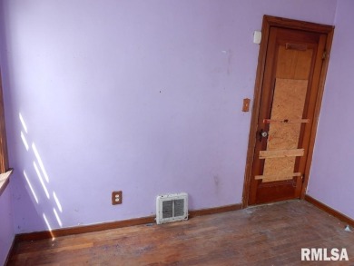 Situated across from Bunn Golf Course and Bunn Park, this 1.5 on Bunn Golf Course in Illinois - for sale on GolfHomes.com, golf home, golf lot