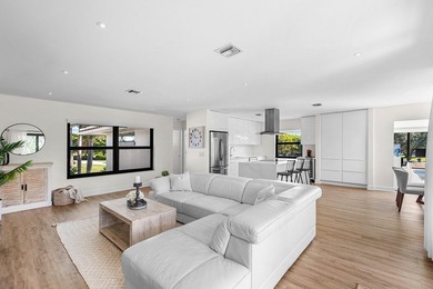 Experience resort-style living in this beautifully renovated on Quail Ridge Golf Course and Country Club in Florida - for sale on GolfHomes.com, golf home, golf lot