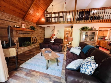 This open concept chalet home is nestled in the woods of Alpine on Alpine Lake Resort in West Virginia - for sale on GolfHomes.com, golf home, golf lot