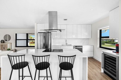 Experience resort-style living in this beautifully renovated on Quail Ridge Golf Course and Country Club in Florida - for sale on GolfHomes.com, golf home, golf lot