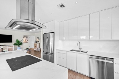 Experience resort-style living in this beautifully renovated on Quail Ridge Golf Course and Country Club in Florida - for sale on GolfHomes.com, golf home, golf lot