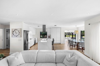 Experience resort-style living in this beautifully renovated on Quail Ridge Golf Course and Country Club in Florida - for sale on GolfHomes.com, golf home, golf lot