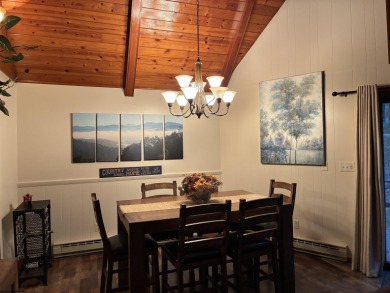 This open concept chalet home is nestled in the woods of Alpine on Alpine Lake Resort in West Virginia - for sale on GolfHomes.com, golf home, golf lot