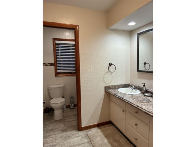 This open concept chalet home is nestled in the woods of Alpine on Alpine Lake Resort in West Virginia - for sale on GolfHomes.com, golf home, golf lot