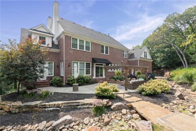 Custom built home on private, large, treed lot with lake views on Loch Lloyd Country Club in Missouri - for sale on GolfHomes.com, golf home, golf lot