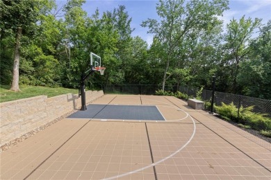 Custom built home on private, large, treed lot with lake views on Loch Lloyd Country Club in Missouri - for sale on GolfHomes.com, golf home, golf lot