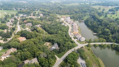 Custom built home on private, large, treed lot with lake views on Loch Lloyd Country Club in Missouri - for sale on GolfHomes.com, golf home, golf lot