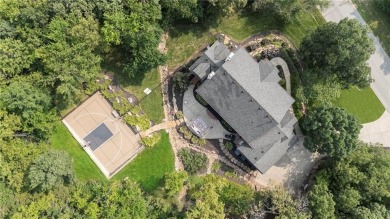 Custom built home on private, large, treed lot with lake views on Loch Lloyd Country Club in Missouri - for sale on GolfHomes.com, golf home, golf lot