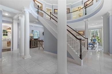Custom built home on private, large, treed lot with lake views on Loch Lloyd Country Club in Missouri - for sale on GolfHomes.com, golf home, golf lot