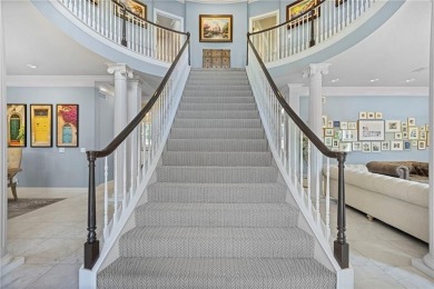Custom built home on private, large, treed lot with lake views on Loch Lloyd Country Club in Missouri - for sale on GolfHomes.com, golf home, golf lot
