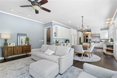 Custom built home on private, large, treed lot with lake views on Loch Lloyd Country Club in Missouri - for sale on GolfHomes.com, golf home, golf lot