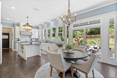 Custom built home on private, large, treed lot with lake views on Loch Lloyd Country Club in Missouri - for sale on GolfHomes.com, golf home, golf lot