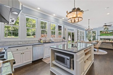Custom built home on private, large, treed lot with lake views on Loch Lloyd Country Club in Missouri - for sale on GolfHomes.com, golf home, golf lot