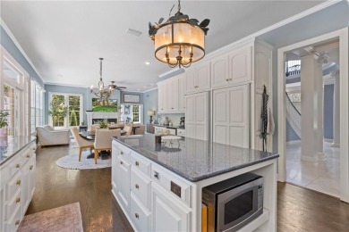 Custom built home on private, large, treed lot with lake views on Loch Lloyd Country Club in Missouri - for sale on GolfHomes.com, golf home, golf lot