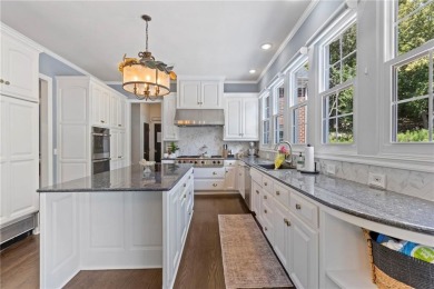 Custom built home on private, large, treed lot with lake views on Loch Lloyd Country Club in Missouri - for sale on GolfHomes.com, golf home, golf lot