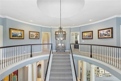 Custom built home on private, large, treed lot with lake views on Loch Lloyd Country Club in Missouri - for sale on GolfHomes.com, golf home, golf lot