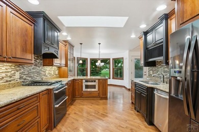 Wake up to wide-open fairway views and the relaxed rhythm of on Desert Hawk At Pueblo West in Colorado - for sale on GolfHomes.com, golf home, golf lot