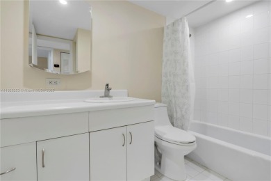 Move-in ready first-floor condo in sought-after Miami Lakes on Don Shulas Golf Course and Club in Florida - for sale on GolfHomes.com, golf home, golf lot